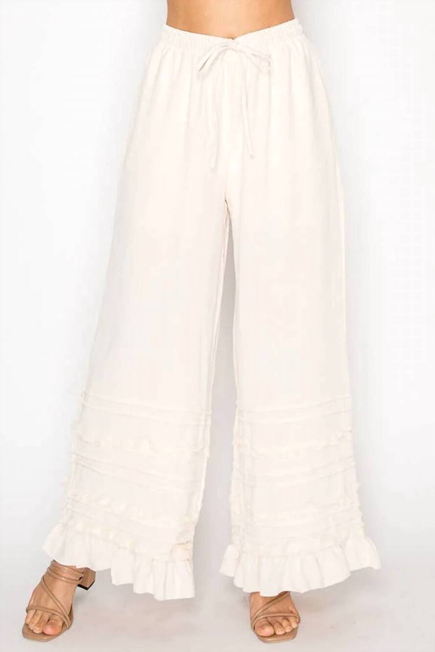 NEW ORIGAMI lined flowy pants with ruffle details in beige